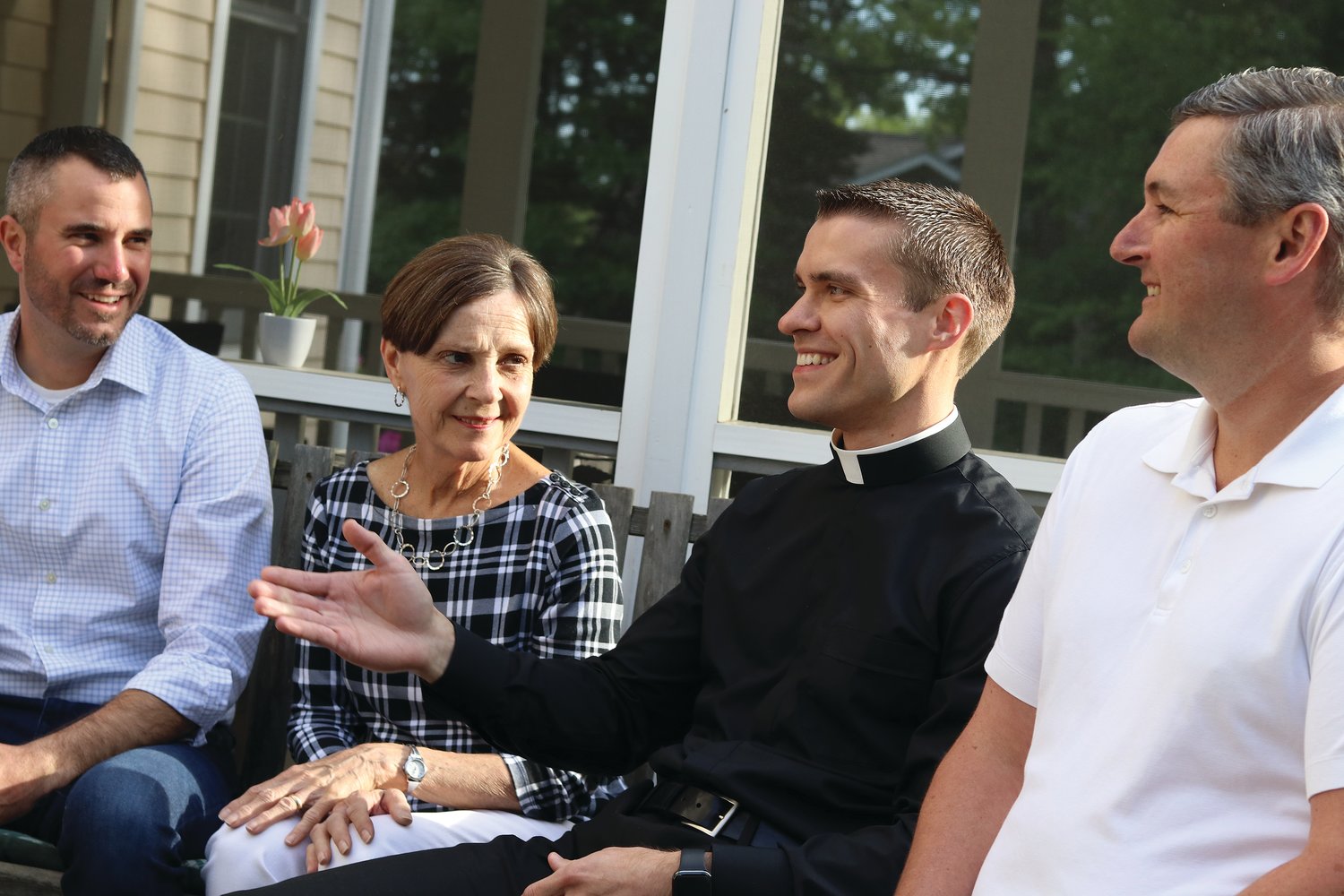 Deacon Gadoury reminisces with his mother and brothers-in-law Tom Hursthouse, left, and Robert O’Malley.